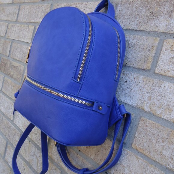 Mini backpack purse with gold tone zippers. main image 9